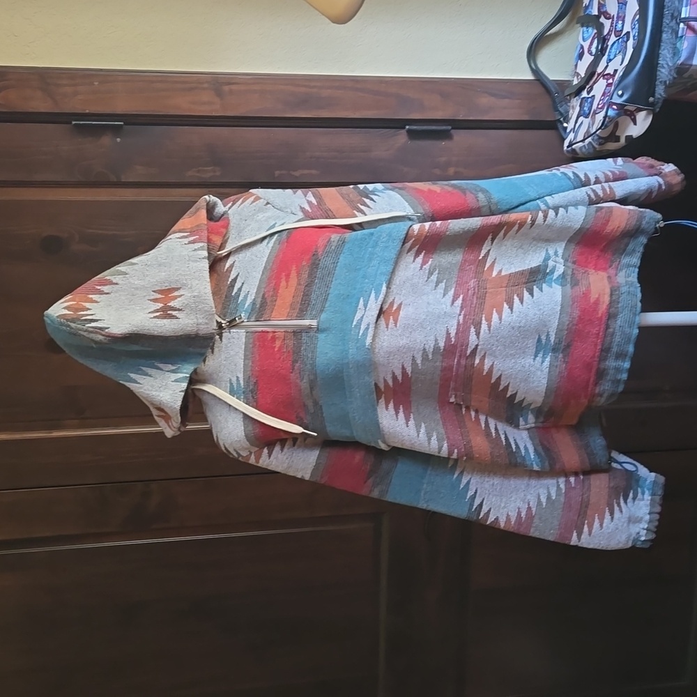 Aztec pull over jacket with hood, excellent condition.